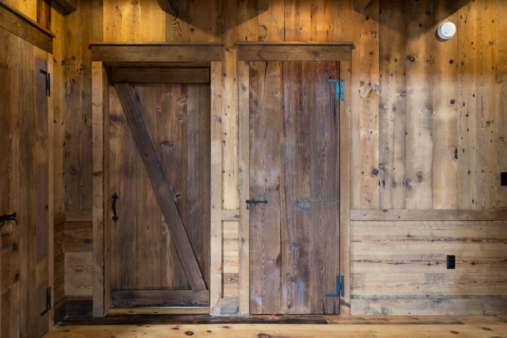 Reclaimed wood wall paneling and doors