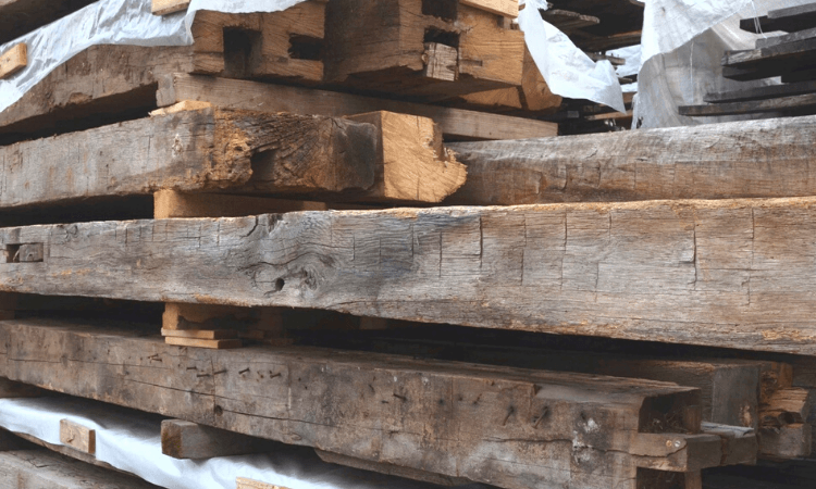 Stack of wood outside from a reclaimed wood supplier