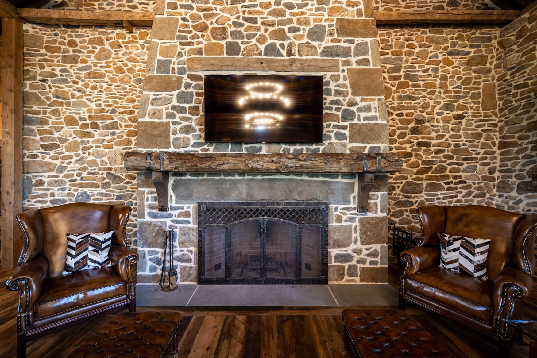 reclaimed wood mantel over a fireplace